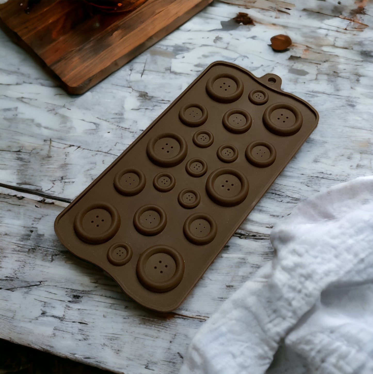 a remote control sitting on a wooden table 