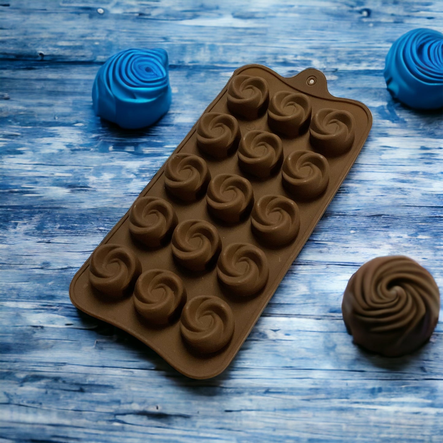 a wooden table with a chocolate cake 